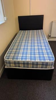 Single - Economy mattress with black divan base and headboar