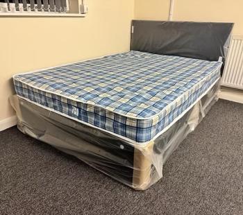 Double Economy Mattress with black divan base and headboard